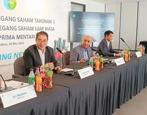 Emiten Distributor Coca-Cola (GRPM) Perpanjang Kesepakatan Akuisisi Saham