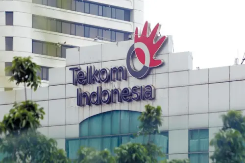 Beban Restrukturisasi Meningkat, UOB Pangkas Target Harga Saham TLKM