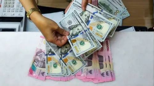 Rupiah Makin Lemah, Tembus Rp18.100 per Dolar