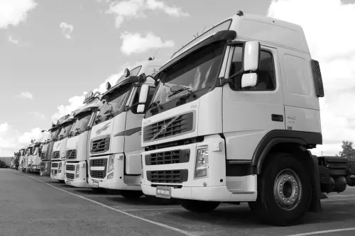 BEI Bekukan Sementara Saham TRUK, Ada Apa?