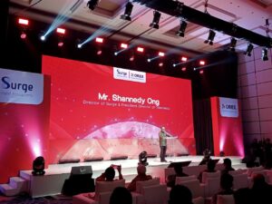Shannedy Ong, Presiden Direktur PT Telemedia Komunikasi Pratama, anak perusahaan SURGE memberikan sambutan